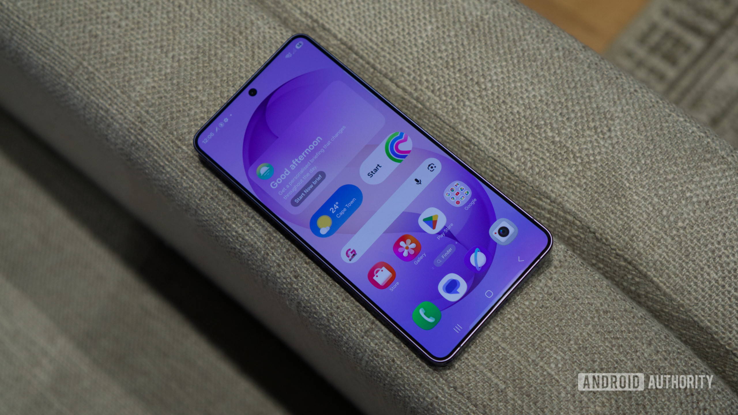 Samsung Galaxy S26 Ultra screen on bed Samsung Galaxy S26 Ultra, showing its home screen.