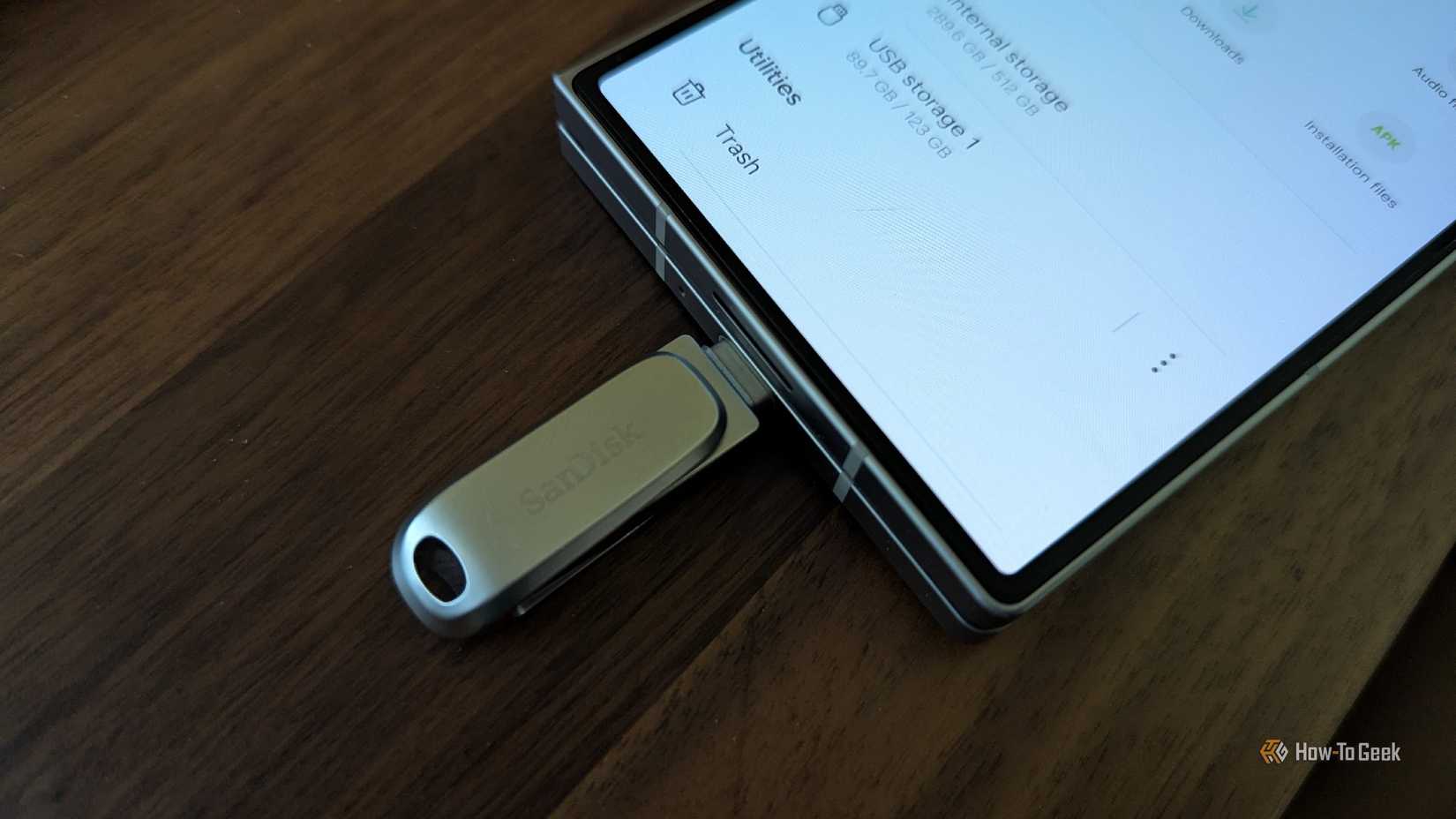A USB-C flash drive is connected to the Samsung Galaxy Z Fold 6.